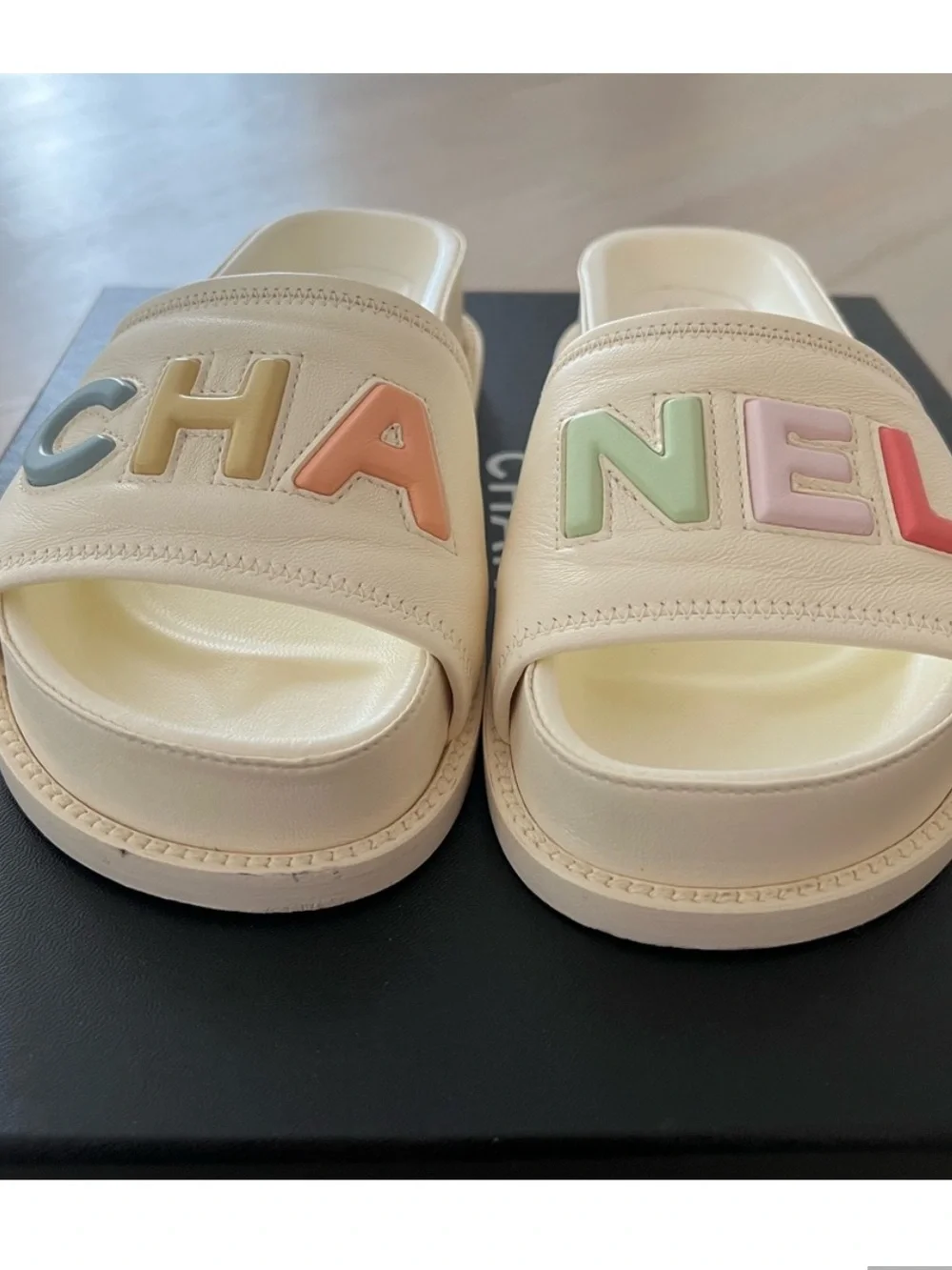 CHANEL Cream Leather Slide Sandals with Pastel Multicolor Logo